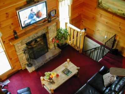 You can watch the Plasma TV while relaxing on the massage chair, just in front of the wood fireplace !!