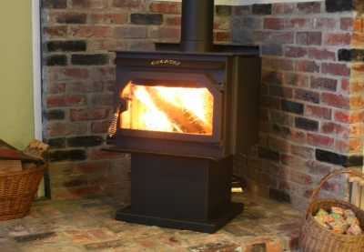New Woodstove and some wood waiting for you