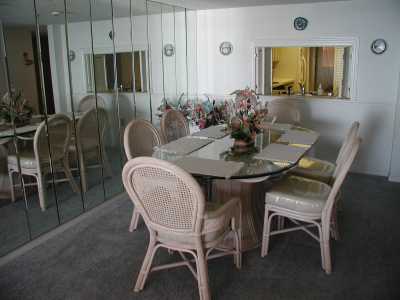 Spacious Dining area with mirror walls