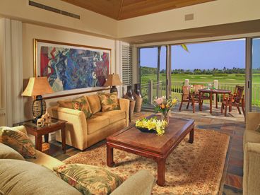 Great room and lanai overlooking the 15th Fairway and ocean beyond