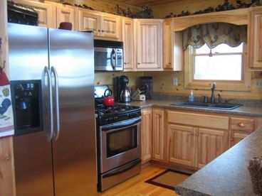 Gourmet kitchen with everything you need...stocked with dishes, cookware, and more