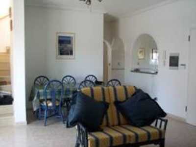 The dining room is well situated and the dining table will sit eight people comfortably.