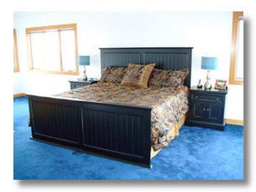 large master bedroom features King bed, LCD TV and DVD