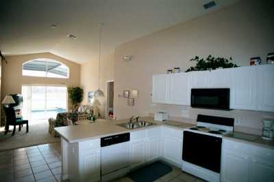 View from Kitchen and Great Room and out to Pool.