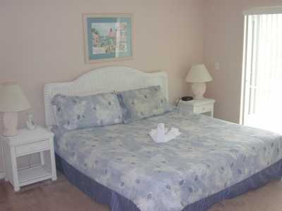 Picture of King Size Master Bedroom with Sliding Glass Door to Pool Area and Hot Tub