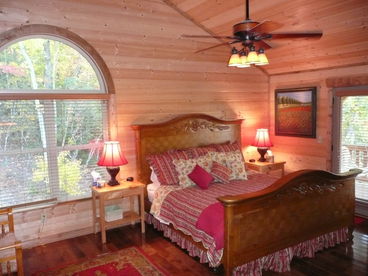 French country decor and a king bed make this Master Bedroom amazingly comfortable, with a private balcony!