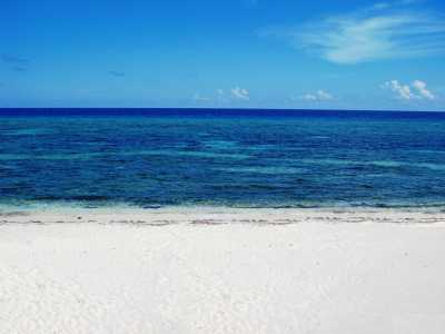 Blue Water & White Sand Beach
Literally right out the Door!