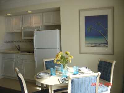 7th & 8th floor condos have dining table & chairs