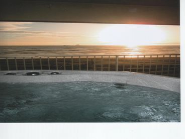 View from the hot tub during a bright sunset