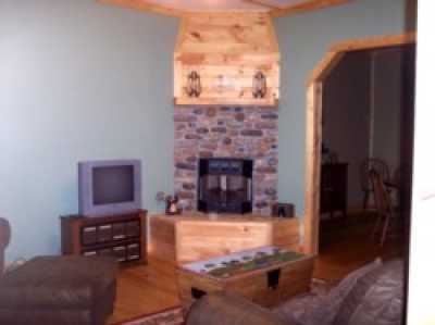 Living room has Cable TV and gas fireplace