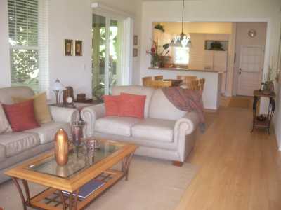 View of living room, dining room & kitchen.