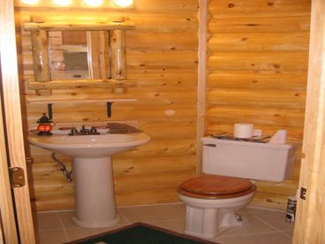 www.wisconsinrentalcabin.com
Wisconsin Cabin bathroom /w ceiling heater