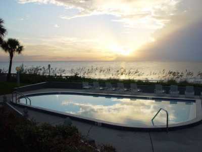 Overlooking pool & beach views from unit.