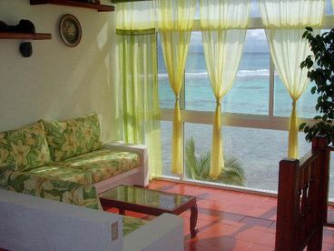 Beautiful living room with a view of all of half moon bay!