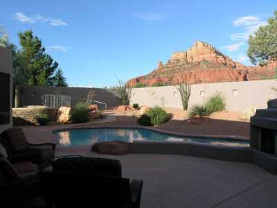 Beautiful view from georgous patio are with barbecue built-in.