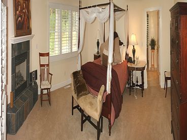 Spacious Master Suite, with luxury bath, fireplace, private terrace and office nook with desk.