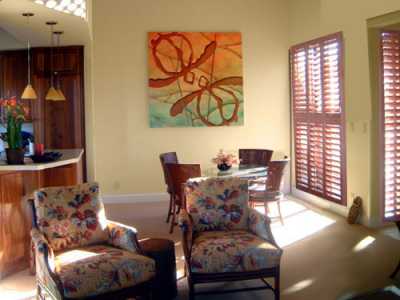 Our Dining room shares the amazing ocean views from the living room and kitchen. A private but open area with our custom HONU (sea turtle) triptic