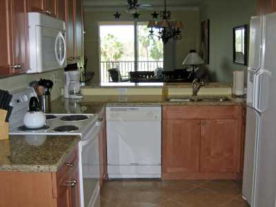 Kitchen features brand new maple cabinets and granite countertops.  The kitchen offers a breakfast nook for dining.