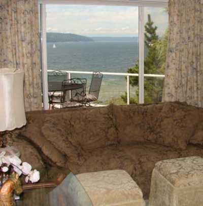 Sit on the sofa and enjoy lovely water views.