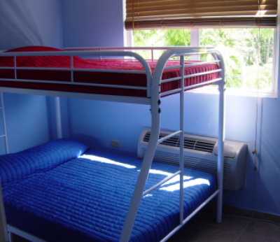 Air Conditioned Bedroom with 1 Full-Twin bunk bed.

