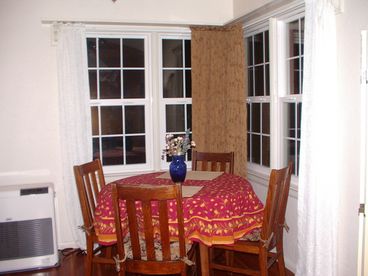 Dining Area Seats 6. Cozy! View of Siskiyou Mountains! Desk/chair/phone. Wood floors all through out the first floor.