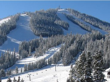 View of Winter Park ski slopes from the deck at Eagles Nest.  Same view through the floor to ceiling windows of the Living Room.