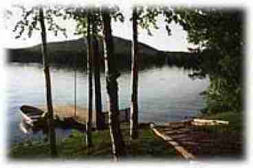 Sandy swimming beach and boat dock just steps away from your cabin. 