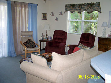 Living room with queen size sleeper sofa and two Laz-y-Boy recliners