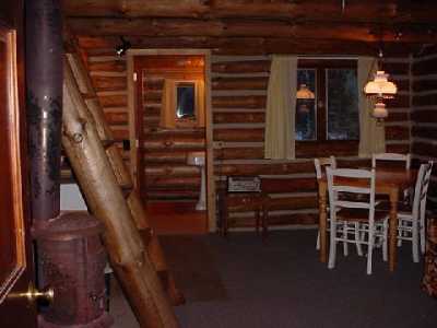 One room log cabin with a full bath.