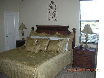Master bedroom with en-suite bathroom and walk through shower room. King size bed, TV, radio with alarm and telephone.