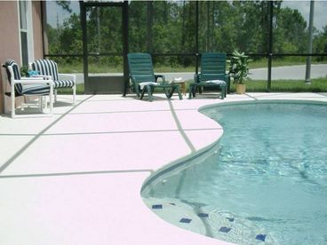 Extended decking around the pool. Rear of the property overlooks conservation area gives added privacy.