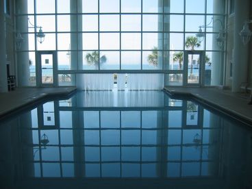 A 3200 sq. ft. multi-level heated indoor / outdoor pool, complete with a Gulf view. Two pool side hot tubs -- offer way to relax.