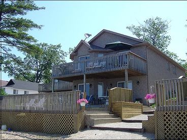 huge waterfront upper & lower decks, sandy waterfront campfire pit, horseshoe pit & more...