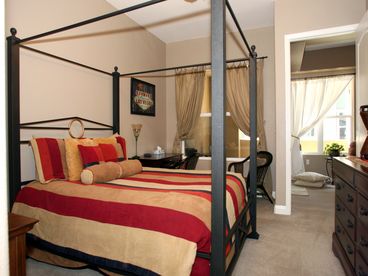Flat screen TV with DVD and cable, queen size pillowtop bed, highspeed internet at desk in master