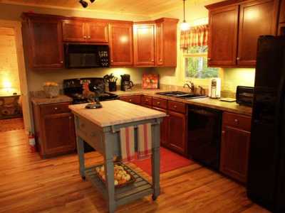 The full kitchen has everything you'll need for making sandwiches or roasting a turkey.