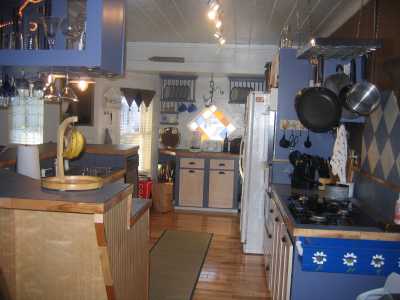 Bright kitchen with gas stove & dishwasher