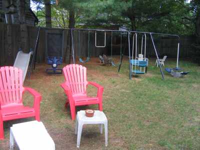 Good size backyard with swingset for kids