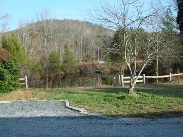 Buck Mountain provides a scenic backdrop for    your morning coffee and the 25 foot deep quarry stocked with bass, bream, and catfish.  