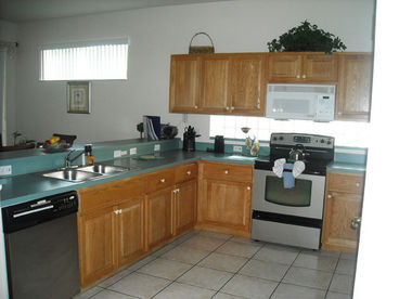 big kitchen with breakfast bar also brand new stainless steel appliances and plenty of cabinet space