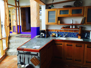 cooking in the kitchen is wonderful, full view of the garden and corridor