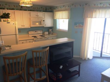 Brand NEW microwave and range with self-cleaning oven.