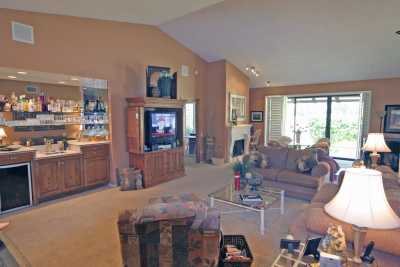 Large living space with Dining room table, card/game table and breakfast bar.  TV's in each bedroom as well as DVD in living room.  Unit has wireless modem and cable internet access.