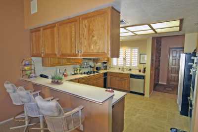 Large kitchen with double oven, large frig, microwave fully stocked with all you need (dishes, silverware).  Plenty of eating areas including outdoor patio set with great view of mountains.