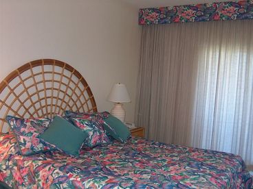 Comfortable and luxurious master suite with king bed, deep soaking tub, TV & DVD player