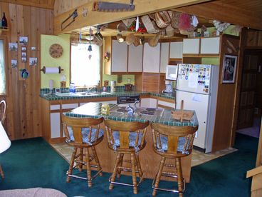 Kitchen with bar stools