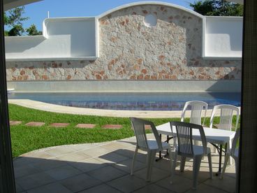 patio is just steps from the large pool