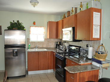 Fully equipped kitchen with, micro, stove, oven, refrigerator, coffee maker, blender and all the comforts of home