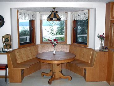 Kitchen Nook with a view out the window of Okanagan Lake, Silver Star Mountain and Vernon.  Fully Contained Kitchen