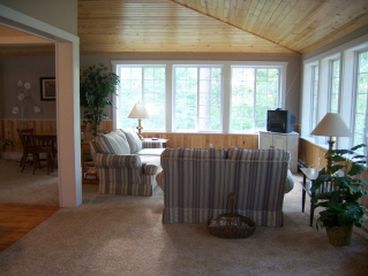Walk in to the livingroom with two walls of windows!