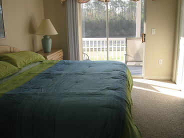 Master bedroom with King bed and View of waterway 